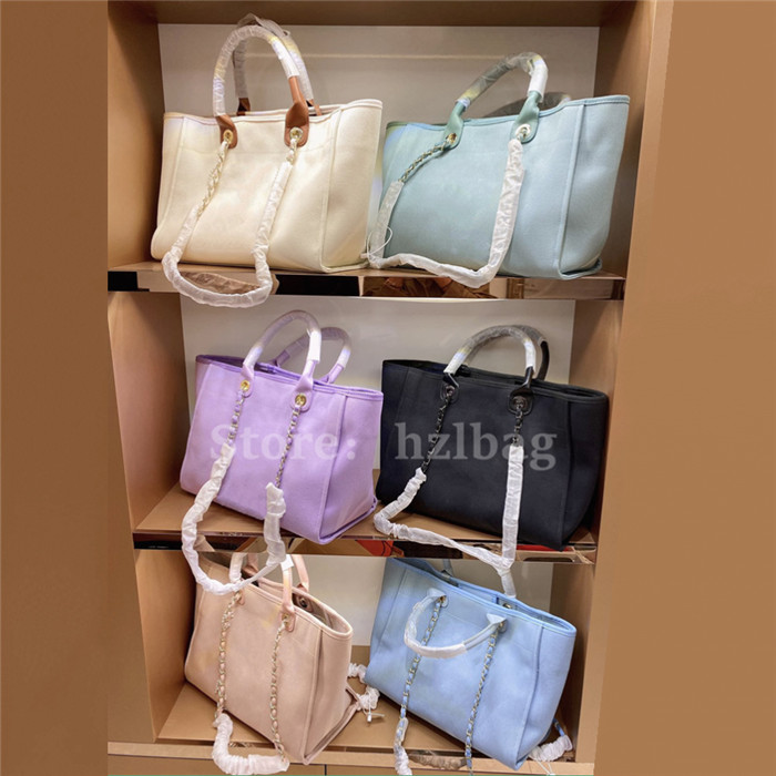 Deauville Tote Pearl Canvas Designer Handbags Cream Large Shopping Bag Chains Beach Shoulder Bags Deauville
Deauville Tote Pearl Canvas Designer Handbags Cream Large Shopping Bag Chains Beach Shoulder Bags Deauville
