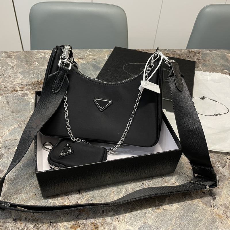 Crossbody Designer Bags 2005 Designers Bags womens 5a re nylon tote 2000 classic chain cross body purse Waterproof Shoulder Luxurious leathe
Crossbody Designer Bags 2005 Designers Bags womens 5a re nylon tote 2000 classic chain cross body purse Waterproof Shoulder Luxurious leathe