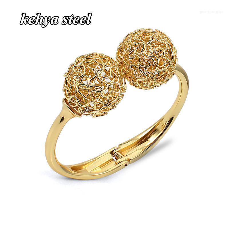 Bangle Gold/Steel Color Fashion Charm Bracelets Jewelry Women Men Double Hollow Ball Couple Lover Valentines Present1
Bangle Gold/Steel Color Fashion Charm Bracelets Jewelry Women Men Double Hollow Ball Couple Lover Valentines Present1