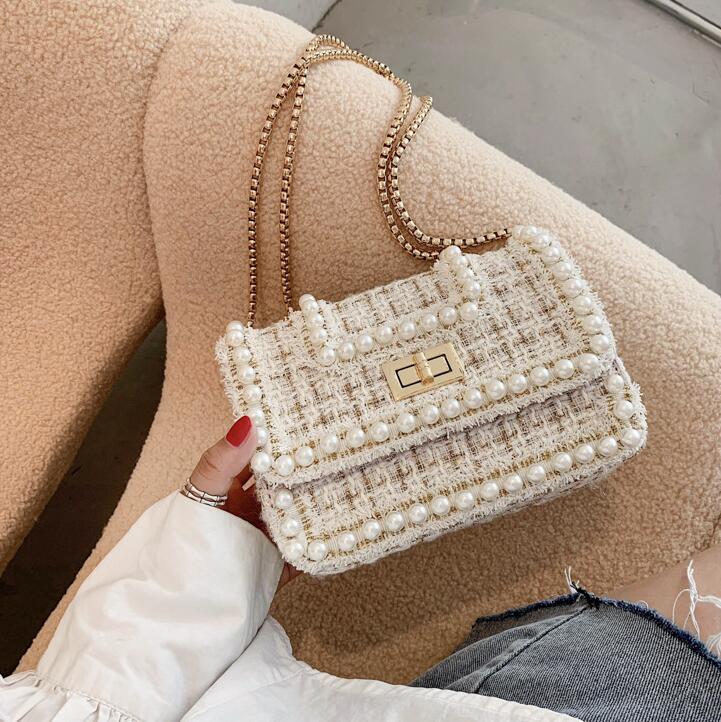 Factory wholesale women handbag winter colorful woolens chain bag sweet and lovely Pearl edging womenes clutch bags leather fashion handbags
Factory wholesale women handbag winter colorful woolens chain bag sweet and lovely Pearl edging womenes clutch bags leather fashion handbags