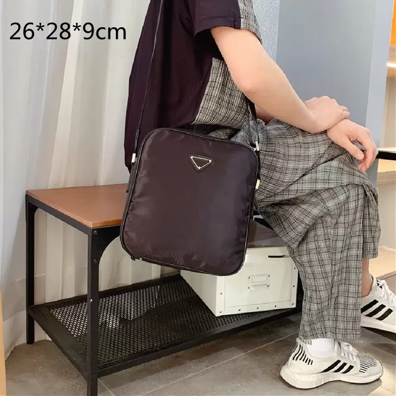 Designer Men's Black 2-sided Briefcases Nylon Crossbody Shoulder Bags Business Handle Briefcase Men Triangle Purses 654455567
Designer Men's Black 2-sided Briefcases Nylon Crossbody Shoulder Bags Business Handle Briefcase Men Triangle Purses 654455567