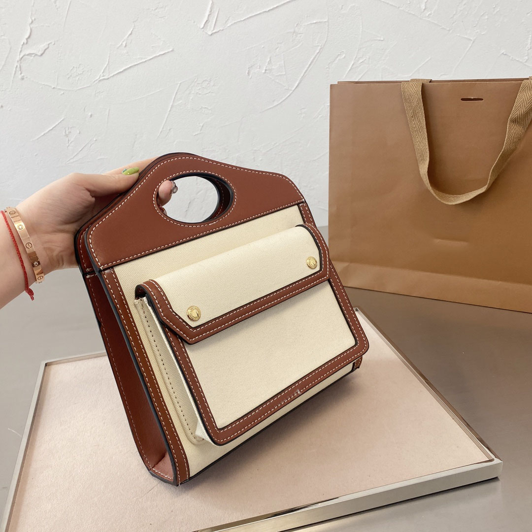 canvas Messenger bag High Quality Luxurys Designers bag Lady Fashion waterproof Totes Clutch Bag Handbags Tote women burber bags 23*19cm 2 styles, Letter
canvas Messenger bag High Quality Luxurys Designers bag Lady Fashion waterproof Totes Clutch Bag Handbags Tote women burber bags 23*19cm 2 styles, Letter
