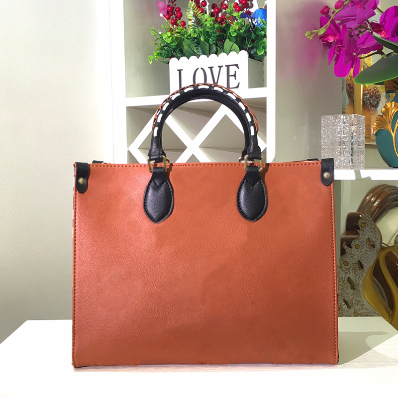 Women Leather Handbags Tote Bag Shopping Bags Embossing letters decoration top material 35cm medium sack
Women Leather Handbags Tote Bag Shopping Bags Embossing letters decoration top material 35cm medium sack