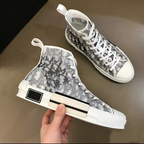 New oblique High quality high Top Sneakers 40110 Homme X KAWS By KIm Jones Men Women Fashion Designer Casual Shoes Skateboard Shoes
New oblique High quality high Top Sneakers 40110 Homme X KAWS By KIm Jones Men Women Fashion Designer Casual Shoes Skateboard Shoes