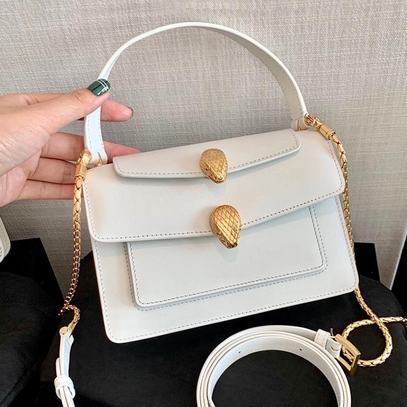 2021 new women's shoulder bag Hong Kong style mini small bag retro leather messenger texture chain designer handbags, Black trumpet
2021 new women's shoulder bag Hong Kong style mini small bag retro leather messenger texture chain designer handbags, Black trumpet