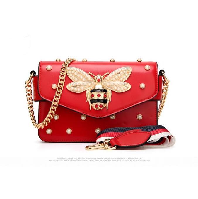 factory sales brand women handbag pearl chain bag small bees lock womens shoulder handbags personality color studded messenger bags
factory sales brand women handbag pearl chain bag small bees lock womens shoulder handbags personality color studded messenger bags