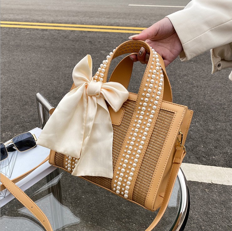 New Pearl Fashion Straw Bag Hand-Woven Shoulder Bag Seaside Vacation Designer Handbag New Women Bags 2021, Khaki bow
New Pearl Fashion Straw Bag Hand-Woven Shoulder Bag Seaside Vacation Designer Handbag New Women Bags 2021, Khaki bow