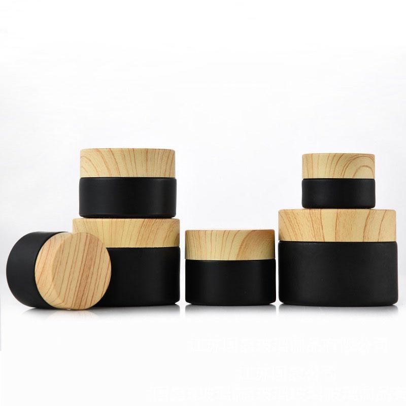 Black frosted glass Packing Bottles jars cosmetic with woodgrain plastic lids PP liner 5g 10g 15g 20g 30 50g lip balm cream containers
Black frosted glass Packing Bottles jars cosmetic with woodgrain plastic lids PP liner 5g 10g 15g 20g 30 50g lip balm cream containers
