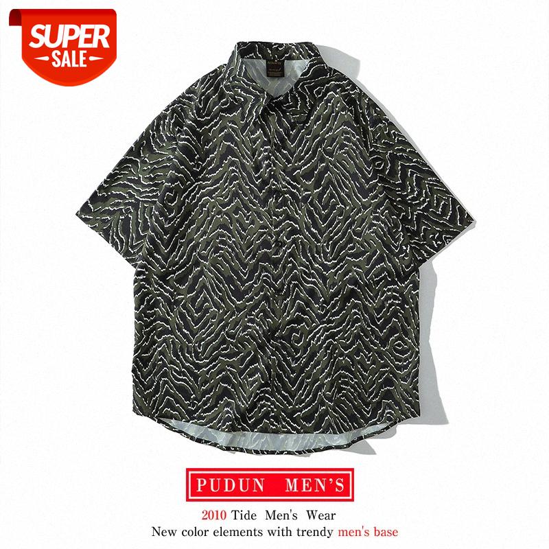 Hong Kong style zebra print couple shirt short-sleeved niche lazy casual all-match men and women personalized #a12r, White;black
Hong Kong style zebra print couple shirt short-sleeved niche lazy casual all-match men and women personalized #a12r, White;black