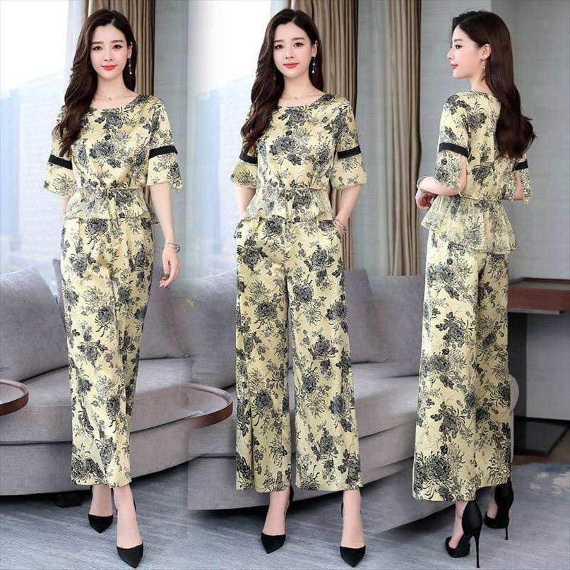 fashion faux silk suit womenpant summer short sleeve and wide leg pants suits printed two piece sets womens outfits, White
fashion faux silk suit womenpant summer short sleeve and wide leg pants suits printed two piece sets womens outfits, White