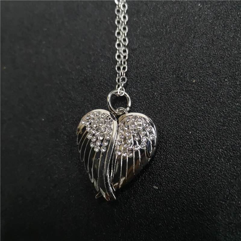 sublimation blank wings locket photo necklaces pendants with zircon fashion hot transfer printing jewelry consumables
sublimation blank wings locket photo necklaces pendants with zircon fashion hot transfer printing jewelry consumables