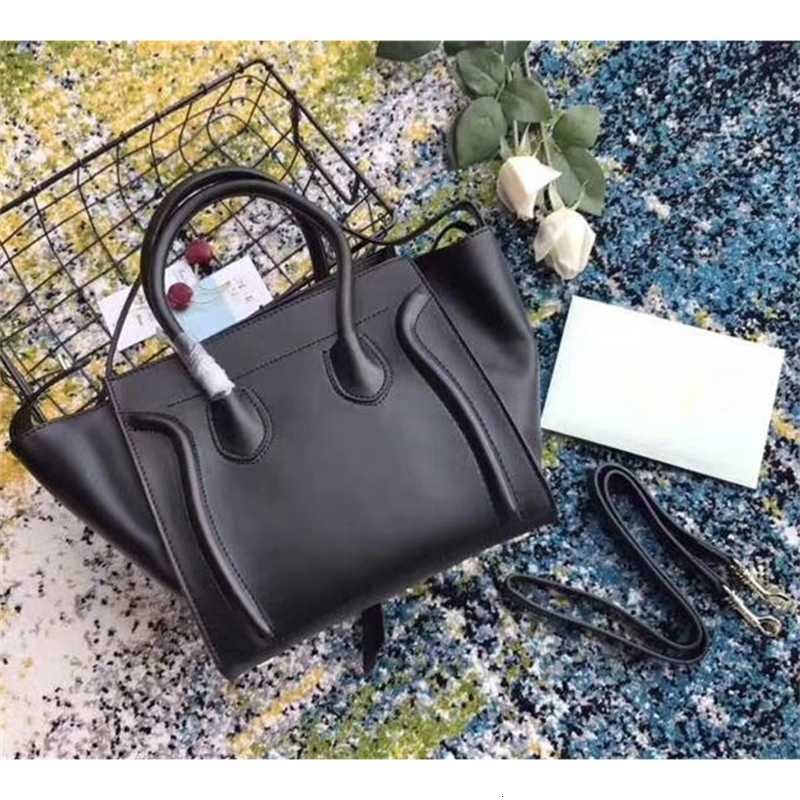 1:1 Classic luxury Ladies Trapeze Casual Tote Handbag Real Cowhide Leather Designer Shoulder Bat Bag With Wrist Purse Bag Boston Handbag
1:1 Classic luxury Ladies Trapeze Casual Tote Handbag Real Cowhide Leather Designer Shoulder Bat Bag With Wrist Purse Bag Boston Handbag