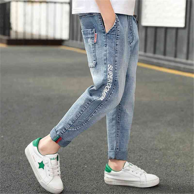Children's middle school elastic jeans spring and autumn children's Pants Boys' long pants Korean slim fashion 2019 NEW