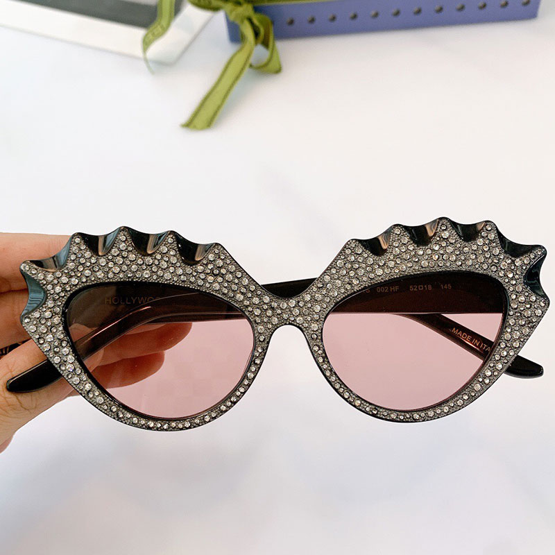 Sunglasses 0781S womens luxury fashion classic personality cat eye frame with silver diamonds woman party travel vacation glasses UV400 designer top quality
Sunglasses 0781S womens luxury fashion classic personality cat eye frame with silver diamonds woman party travel vacation glasses UV400 designer top quality