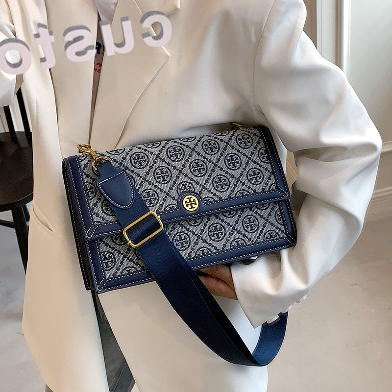 tb new fashion cowhide organ leisure trend old canvas wide shoulder belt camera small square bag messenger
tb new fashion cowhide organ leisure trend old canvas wide shoulder belt camera small square bag messenger