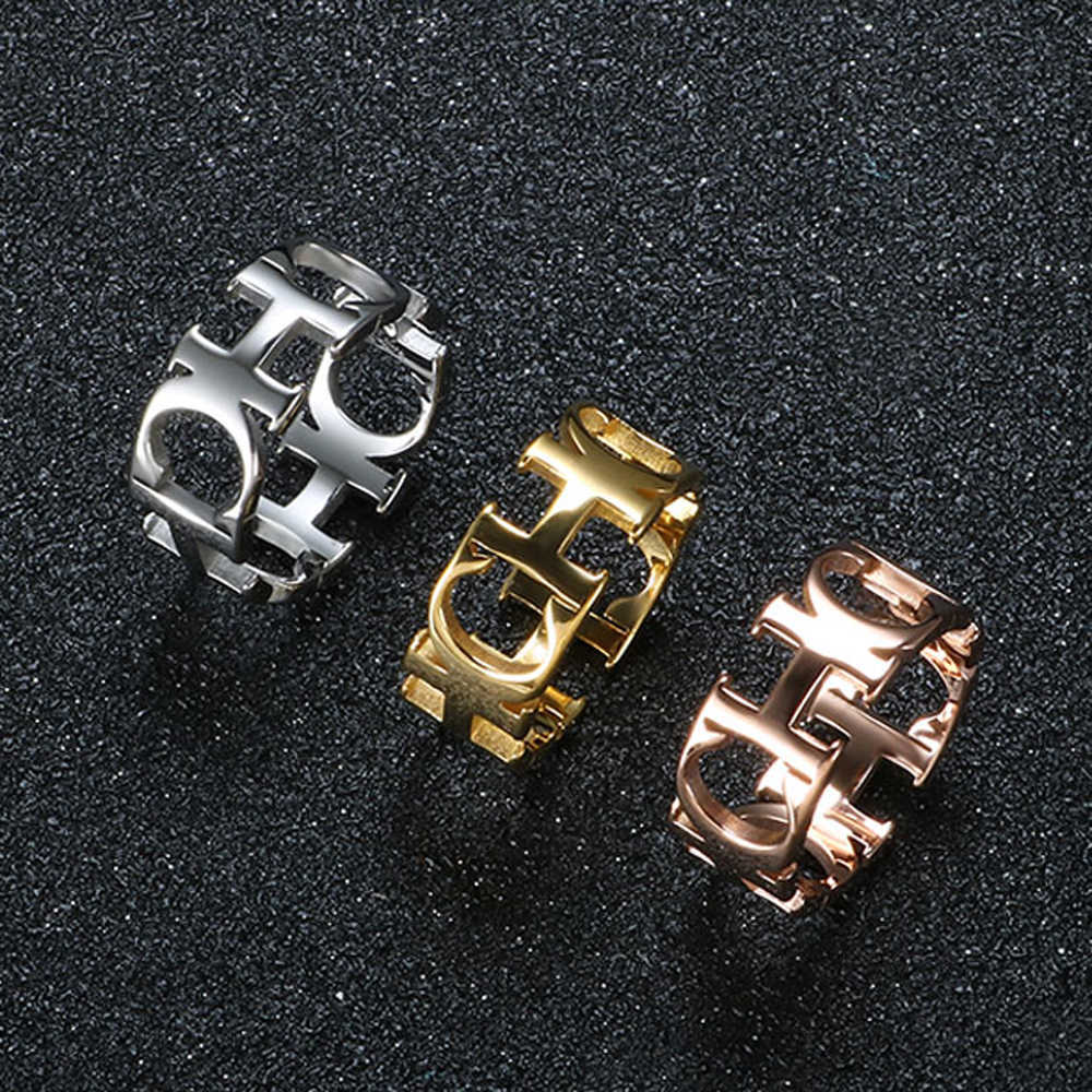 Luxury High Quality Jewelry Stainless Steel Hollowed Cut Letter CH Ring For Woman Man Unisex Wedding Lover Ring Jewelry X0715
Luxury High Quality Jewelry Stainless Steel Hollowed Cut Letter CH Ring For Woman Man Unisex Wedding Lover Ring Jewelry X0715