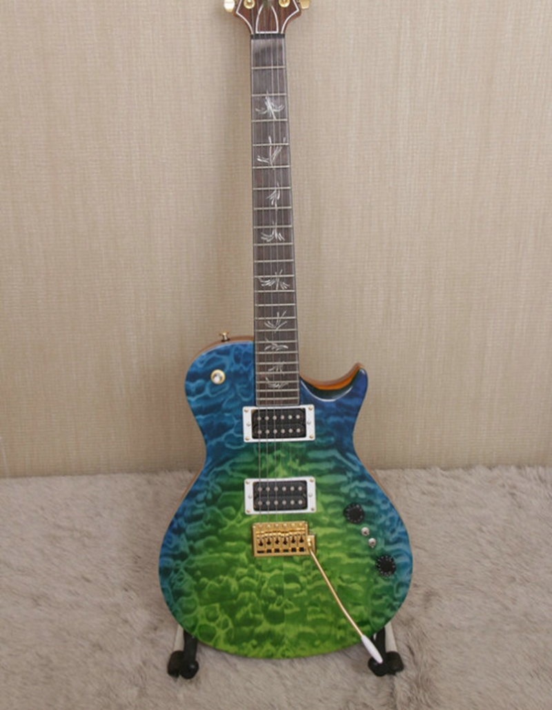 Promotion! Rare Paul Reed Laguna Dragon's Breath Quilted Maple Top Electric Guitar Tremolo Bridge, Natural Binding, Brushstroke Birds Inlay
Promotion! Rare Paul Reed Laguna Dragon's Breath Quilted Maple Top Electric Guitar Tremolo Bridge, Natural Binding, Brushstroke Birds Inlay