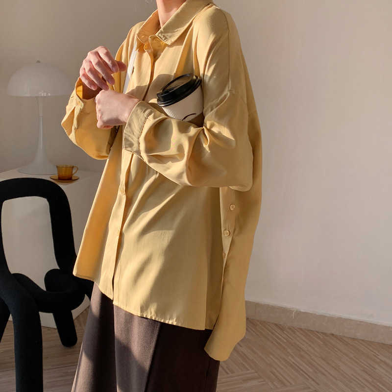 Spring Black Irregular Loose Shirts Women's Casual Solid Long Sleeve Button Up White Blouse Blusas Mujer De Moda 210607
Spring Black Irregular Loose Shirts Women's Casual Solid Long Sleeve Button Up White Blouse Blusas Mujer De Moda 210607