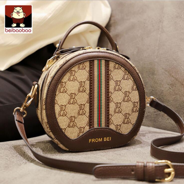 wholesale women brand shoulder bag high quality round leather womens handbag sweet and lovely cartoon bear fashion handbags retro contrast leathers messenger bags
wholesale women brand shoulder bag high quality round leather womens handbag sweet and lovely cartoon bear fashion handbags retro contrast leathers messenger bags