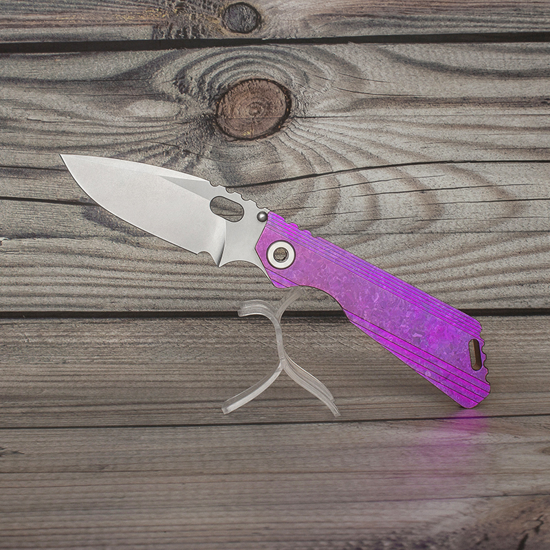 EVIL EYES customized folding knife SNG DDC #9 purple crystalline titanium handle hand grinding m390 blade pocket knives outdoor tactical cam
EVIL EYES customized folding knife SNG DDC #9 purple crystalline titanium handle hand grinding m390 blade pocket knives outdoor tactical cam