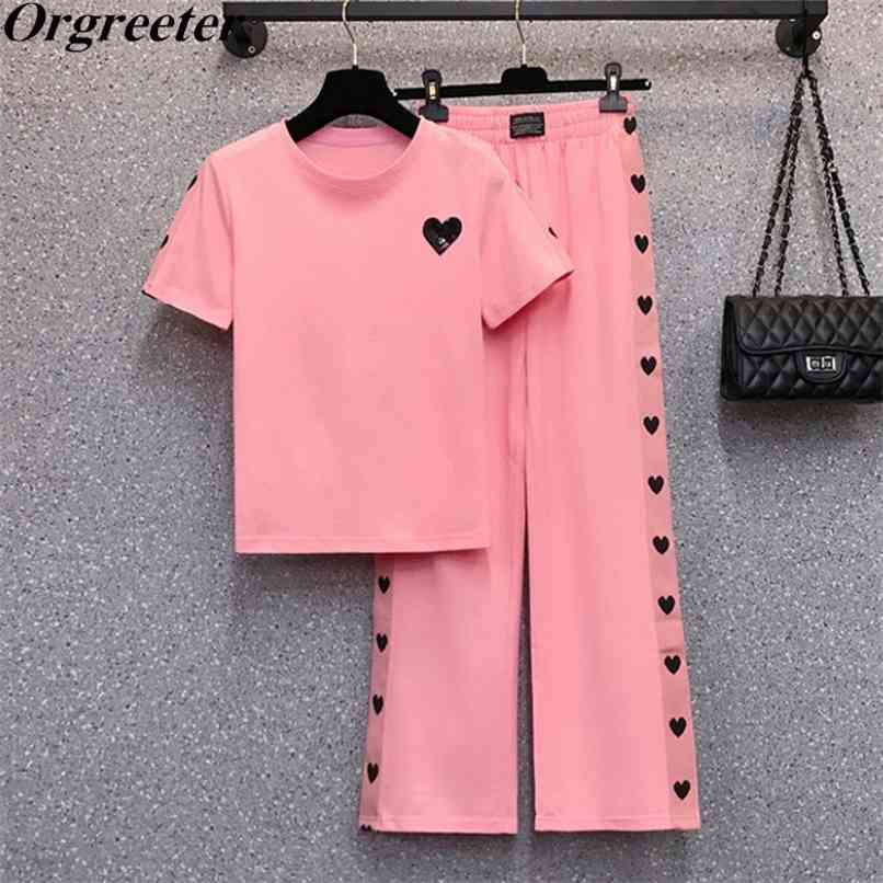 Pink Tracksuit Women Summer O-neck Short Sleeve Sequined Tshirt +Side Heart-shaped Jacquard Wide leg pants Two piece sets 210602
Pink Tracksuit Women Summer O-neck Short Sleeve Sequined Tshirt +Side Heart-shaped Jacquard Wide leg pants Two piece sets 210602