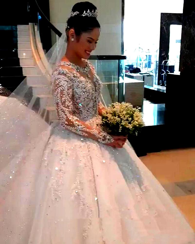 2022 Luxury Crystals Beaded Wedding Dress Lace Full Sleeve Bride Ball Gown Long Train Chapel Wedding Gowns Illusion Crew Neck Dubai Style Bridal Dress
