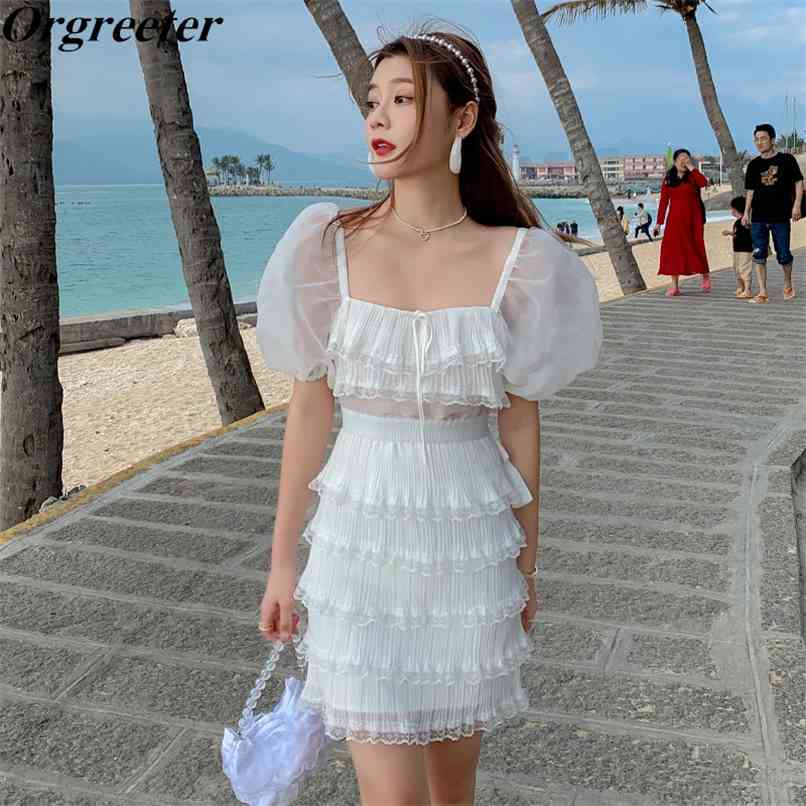 Sexy Square collar Backless Bow Lace Up White Pleated Dress Women Summer Organza Puff sleeve Chiffon Patchwork Mini Beach 210602
Sexy Square collar Backless Bow Lace Up White Pleated Dress Women Summer Organza Puff sleeve Chiffon Patchwork Mini Beach 210602