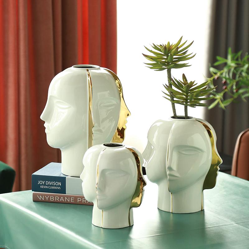 Creative Ceramic Abstract Human Face Vase Flower Arrangement Living Room Decoration Gilded Art Head Vase Crafts Home Decoration
Creative Ceramic Abstract Human Face Vase Flower Arrangement Living Room Decoration Gilded Art Head Vase Crafts Home Decoration