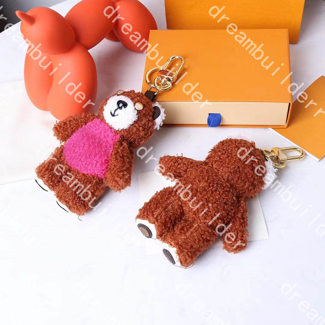 M69854 fashion Designer keychain Handmade Doll Car Keychains Women Bag Charm Hanging decoration Pendant Accessories
M69854 fashion Designer keychain Handmade Doll Car Keychains Women Bag Charm Hanging decoration Pendant Accessories