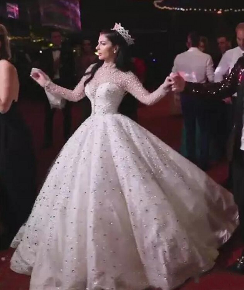 2021 New Luxury Crystals High Collar Long Sleeve Ball Gown Wedding Es Bling Arabic Dubai Bridal Gowns Vestidos De Mariee Riin, Ivory
2021 New Luxury Crystals High Collar Long Sleeve Ball Gown Wedding Es Bling Arabic Dubai Bridal Gowns Vestidos De Mariee Riin, Ivory