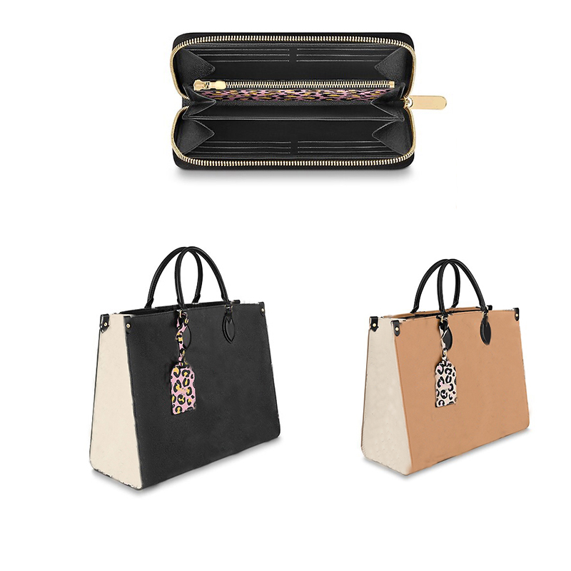 M45814 cartoon Wild at Heart series Onthego tote bags designers handbags Cow leather embossed leopard print mommy bag wallets
M45814 cartoon Wild at Heart series Onthego tote bags designers handbags Cow leather embossed leopard print mommy bag wallets