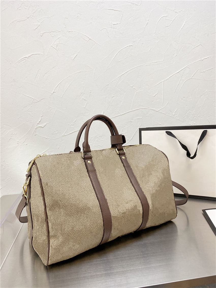 Men Women leather Totes Luxurys Designers Duffle Bags 2021 Man Woman handbag Handbags Large Capacity Travel Tote packs, Brown
Men Women leather Totes Luxurys Designers Duffle Bags 2021 Man Woman handbag Handbags Large Capacity Travel Tote packs, Brown