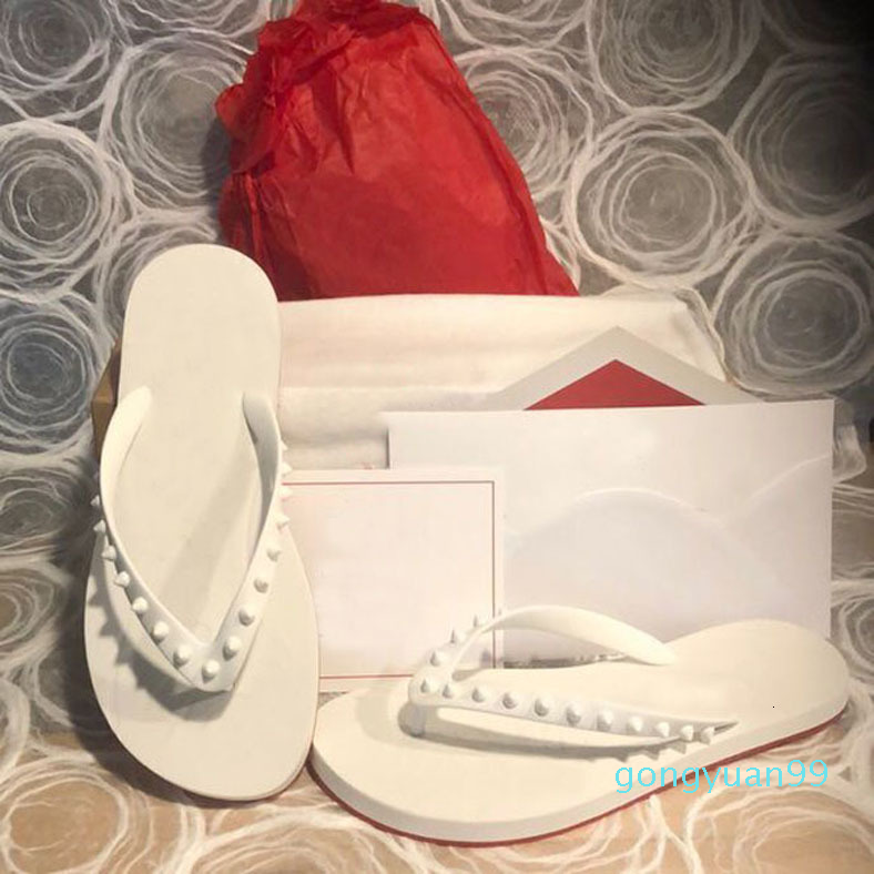 Red soles flip-flops black leather rivet slippers slipper sandals men and women rubber
Red soles flip-flops black leather rivet slippers slipper sandals men and women rubber