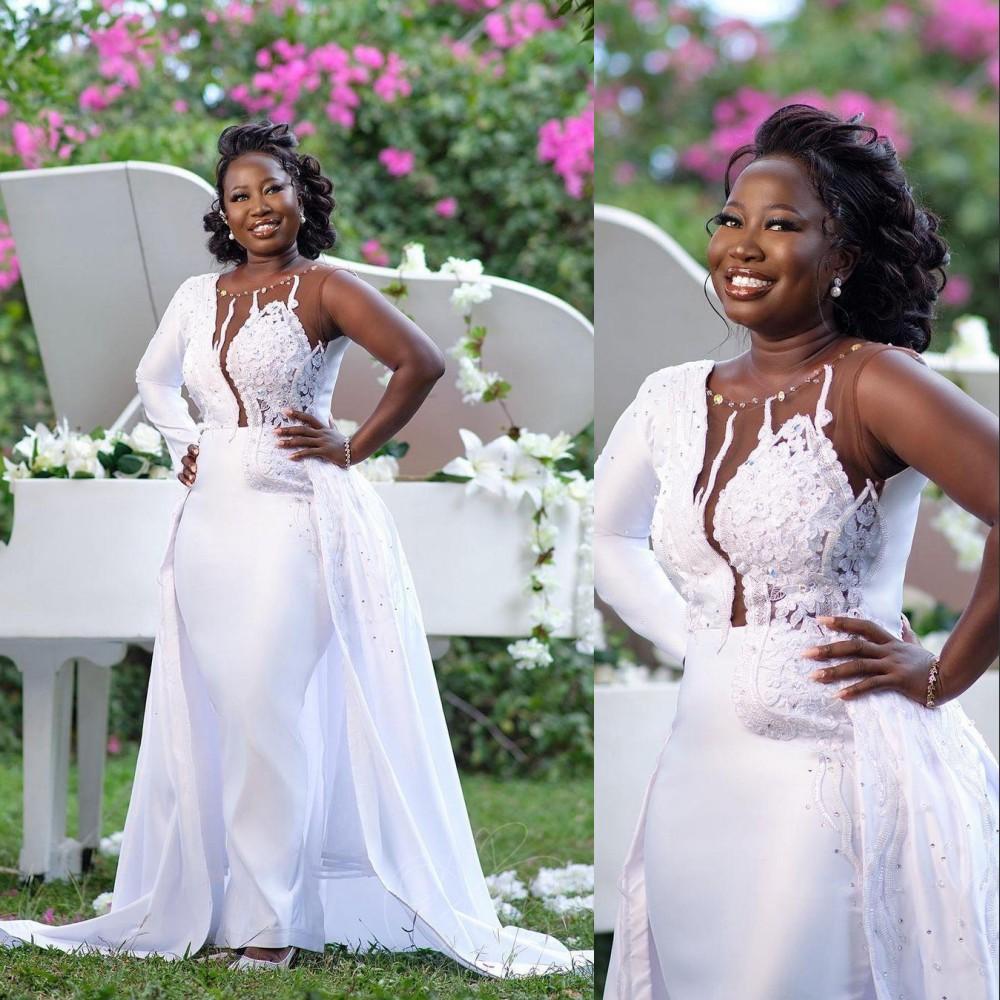 African Mermaid Wedding Dresses Arabic Bride Gowns Jewel Neck Illusion Lace Appliques Crystal Beads Detachable Train Overskirts Plus Size Long Sleeve, White
African Mermaid Wedding Dresses Arabic Bride Gowns Jewel Neck Illusion Lace Appliques Crystal Beads Detachable Train Overskirts Plus Size Long Sleeve, White
