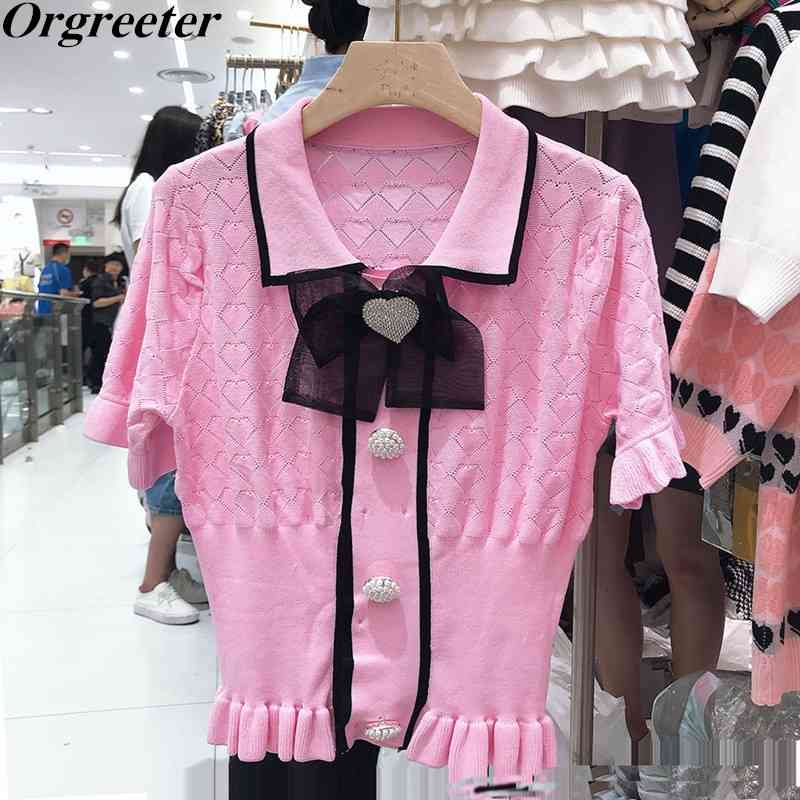 Knitted Pearl Button Pullover Tops Summer Lapel Hollow out Breathable Diamond Bowknot Ruched Hem Thin Sweater 210525, White
Knitted Pearl Button Pullover Tops Summer Lapel Hollow out Breathable Diamond Bowknot Ruched Hem Thin Sweater 210525, White