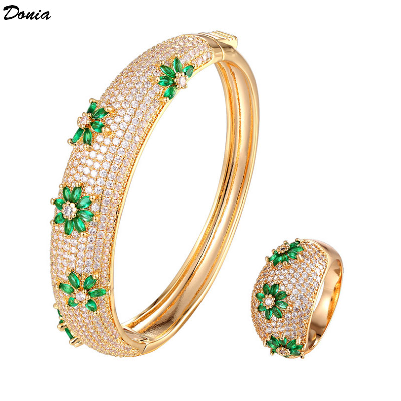 Culturally Inspired Accessory: Donias Finely Crafted Wrist Adornment with Detailed Floral Motifs