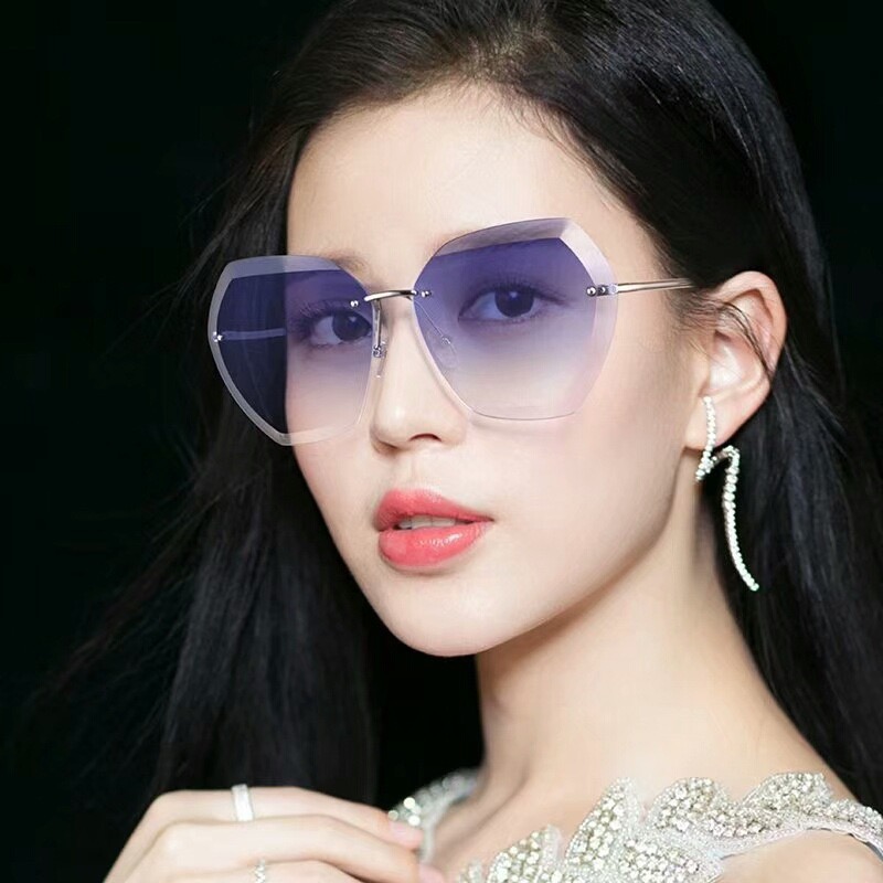 2021New women's sunglasses ocean slice polygonal trimming fashion rimless metal legs big frame sun high-quality wholesale
2021New women's sunglasses ocean slice polygonal trimming fashion rimless metal legs big frame sun high-quality wholesale