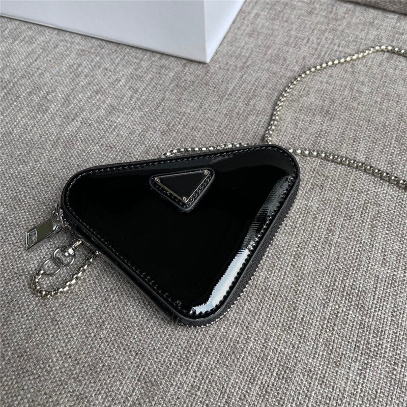 Free Shipping Worldwide Size 13cm Mini Fashion Cute Patent Leather Triangle Bag Coin Purse Shoulder Bag Ladies Best Quality Messenger Bag
Free Shipping Worldwide Size 13cm Mini Fashion Cute Patent Leather Triangle Bag Coin Purse Shoulder Bag Ladies Best Quality Messenger Bag