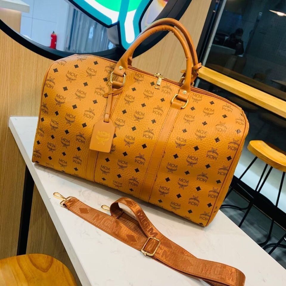 men luxury women travel PU Leather duffle bag brand designer luggage handbags large capacity sports bagS 45CM
men luxury women travel PU Leather duffle bag brand designer luggage handbags large capacity sports bagS 45CM