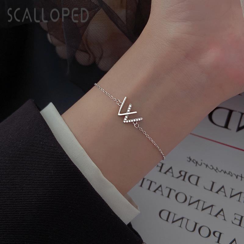 Charm Bracelets SCALLOPED Fashion Letter W Bracelet Women Sparkling Crystal Adjustable Chain Designer Statement Jewelry Pulseira Feminia
Charm Bracelets SCALLOPED Fashion Letter W Bracelet Women Sparkling Crystal Adjustable Chain Designer Statement Jewelry Pulseira Feminia