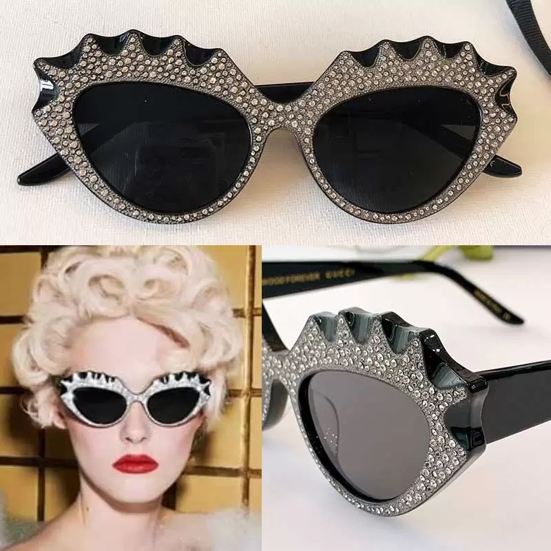 22SS Official latest Womens Luxury sunglasses 0781S black fashion personality cat eye frame with silver diamonds shopping party glasses UV400 designer top quality
22SS Official latest Womens Luxury sunglasses 0781S black fashion personality cat eye frame with silver diamonds shopping party glasses UV400 designer top quality