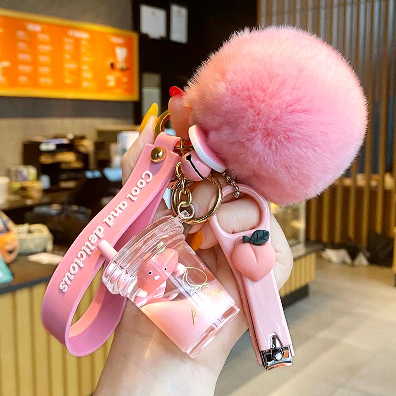 Keychains Creative Milk Bottle Crystal Keychain Cute Hairy Ball Flowing Liquid Key Chain Computer Nail Clipper Bag Pendant
Keychains Creative Milk Bottle Crystal Keychain Cute Hairy Ball Flowing Liquid Key Chain Computer Nail Clipper Bag Pendant