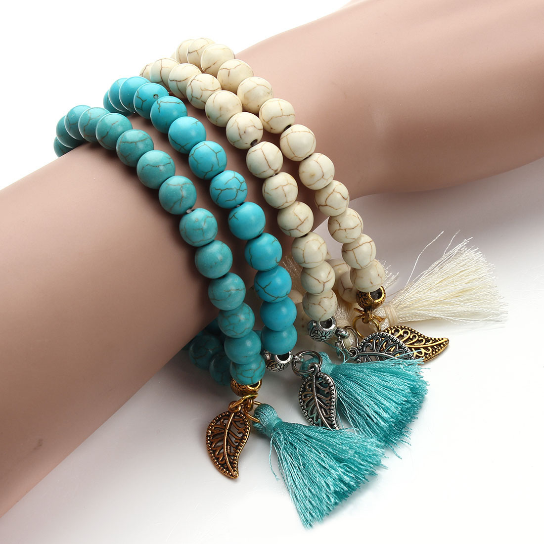 Vintage Gold Silver Color Leaf Pendant Natural Stone Blue / White Turquoises Beads Bracelets Women Fashion Tassel Bracelet
Vintage Gold Silver Color Leaf Pendant Natural Stone Blue / White Turquoises Beads Bracelets Women Fashion Tassel Bracelet