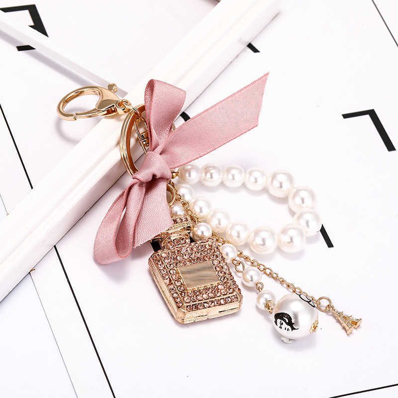 Fashion Pearl Perfume Bottle Keychain Car Key Ring Women Bag Charm Accessories Cute Bow Key Chain Creative Keyrings R250728
