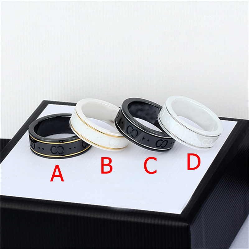 Ceramic double g stones black white gold bilateral hollow finger trendy fashion net red male and female couple pair ring
Ceramic double g stones black white gold bilateral hollow finger trendy fashion net red male and female couple pair ring