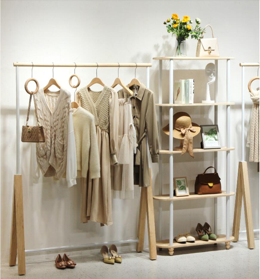 Clothing store display rack women's cloth shop hanging Organization shoe bag racks landing against the wall clothes Storage Holders white