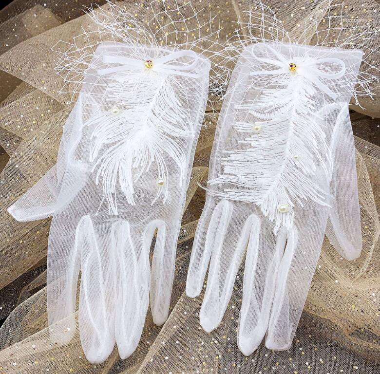 Women's Elegant White Color Pearl Beaded Tassel Mesh Glove Female Spring Summer Sunscreen Lace R28061
Women's Elegant White Color Pearl Beaded Tassel Mesh Glove Female Spring Summer Sunscreen Lace R28061