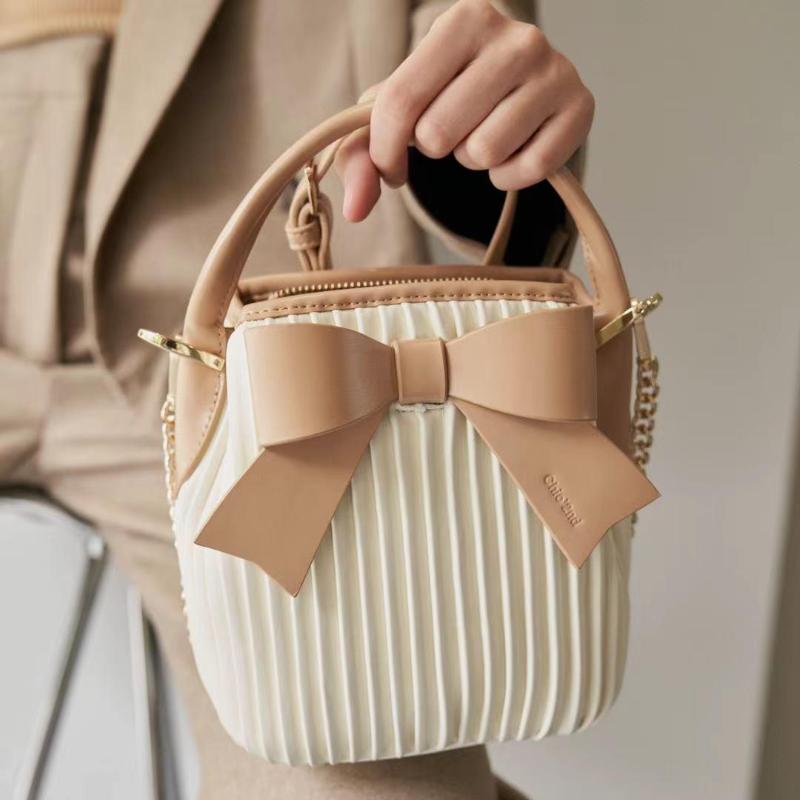 Lady style apricot handbag with bow decoration women's shoulder bag summer fashion chain cross body Purse, As pic
Lady style apricot handbag with bow decoration women's shoulder bag summer fashion chain cross body Purse, As pic