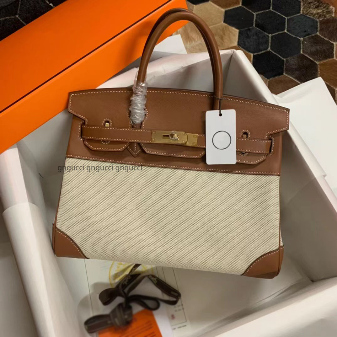 Bags Herm Platinum cloth with leather Women Original Brand Fashion Luxurys designers genuine leather handbag clutch 25cm 30cm Gold Silver Buckle shoulder, Pay for freight
Bags Herm Platinum cloth with leather Women Original Brand Fashion Luxurys designers genuine leather handbag clutch 25cm 30cm Gold Silver Buckle shoulder, Pay for freight