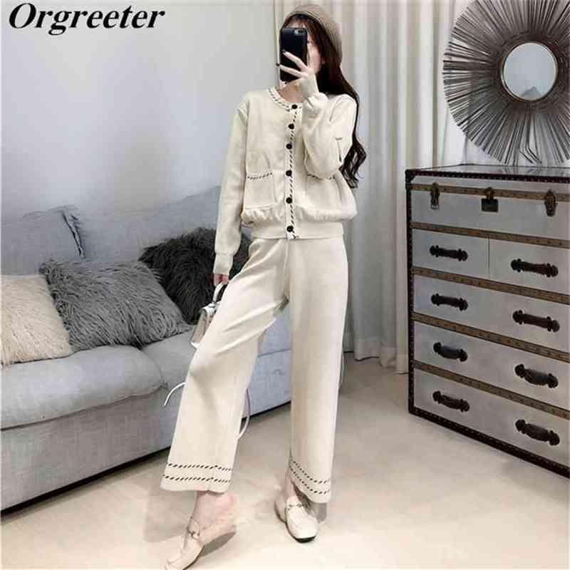 Retro single-breasted Double pocket line Jacquard O-neck Knitted Lantern Cardigan Sweater Jacket Two-piece Wide-leg Pants Suit 210602, Beige
Retro single-breasted Double pocket line Jacquard O-neck Knitted Lantern Cardigan Sweater Jacket Two-piece Wide-leg Pants Suit 210602, Beige